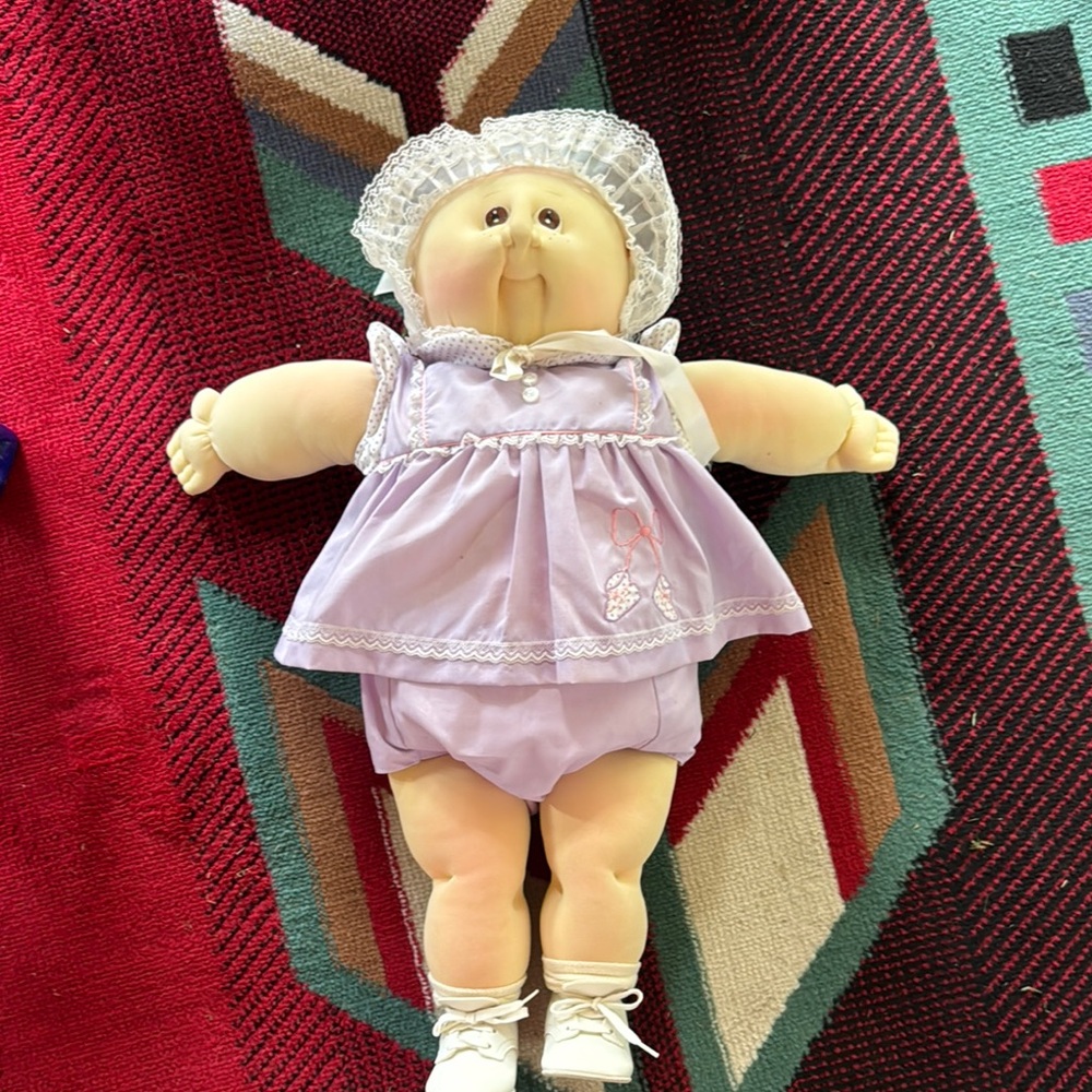 Charming Purple and White Doll with Accessories